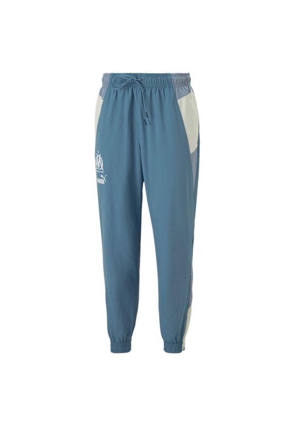 Puma - spodnie dresowe om 2022/23. Kolor: niebieski. Materiał: dresówka. Sport: piłka nożna