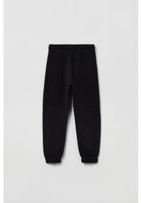 OVS spodnie dresowe dziecięce kolor czarny gładkie. Kolor: czarny. Materiał: dresówka. Wzór: gładki