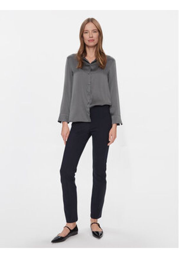 TOMMY HILFIGER - Tommy Hilfiger Spodnie materiałowe Elevated WW0WW39721 Granatowy Slim Fit. Kolor: niebieski. Materiał: wiskoza