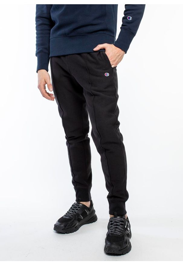 Spodnie dresowe męskie Champion Reverse Weave Cuffed Joggers (215162-KK001). Kolor: czarny. Materiał: dresówka