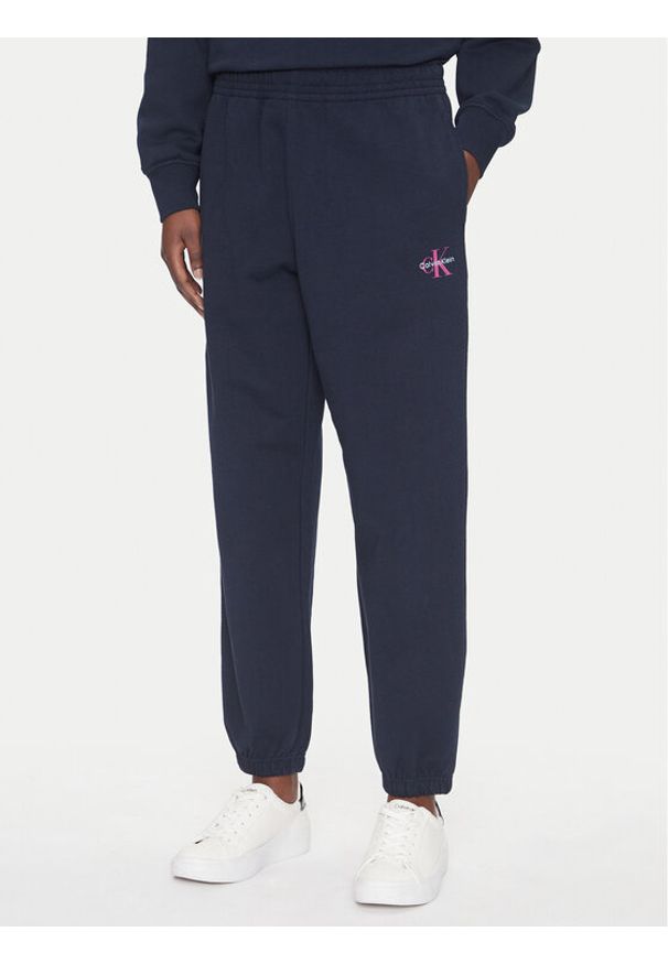 Calvin Klein Jeans Spodnie dresowe Monologo LV047B235G Granatowy Regular Fit. Kolor: niebieski. Materiał: bawełna