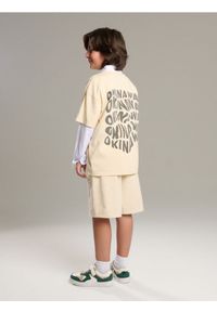 Sinsay - Koszulka oversize z nadrukiem na plecach - kremowy. Kolor: kremowy. Wzór: nadruk #1