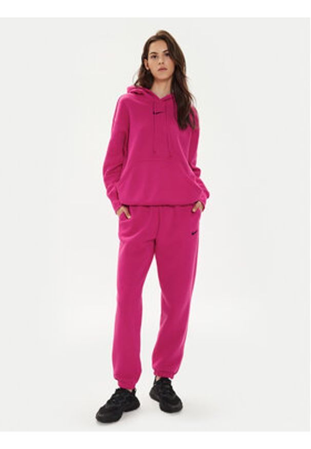 Nike Spodnie dresowe DQ5887 Różowy Oversize. Kolor: różowy. Materiał: bawełna