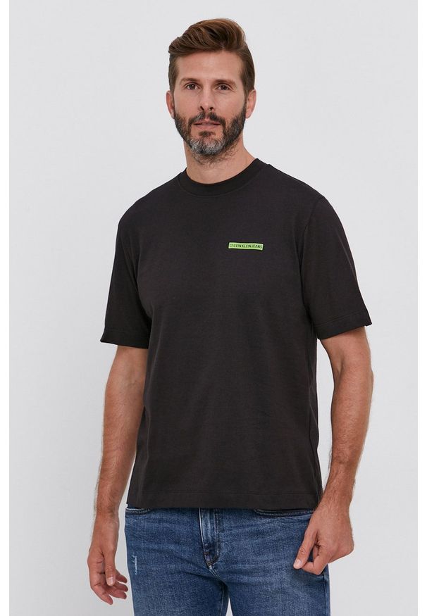 Calvin Klein Jeans - T-shirt bawełniany. Okazja: na co dzień. Kolor: czarny. Materiał: bawełna. Wzór: gładki. Styl: casual