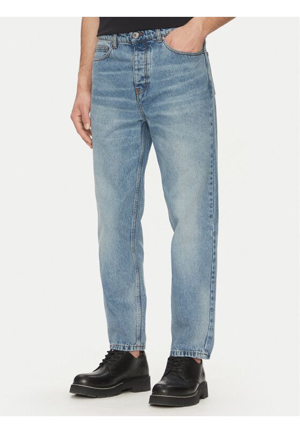 AMI PARIS - AMI Paris Jeansy HTR103.DE0046 Niebieski Tapered Fit. Kolor: niebieski