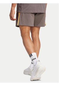 Adidas - adidas Szorty sportowe Essentials French Terry 3-Stripes IS1346 Brązowy Regular Fit. Kolor: brązowy. Materiał: bawełna. Styl: sportowy