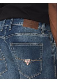 Guess Jeansy M5GAS2 D4Z80 Niebieski Slim Tapered Fit. Kolor: niebieski
