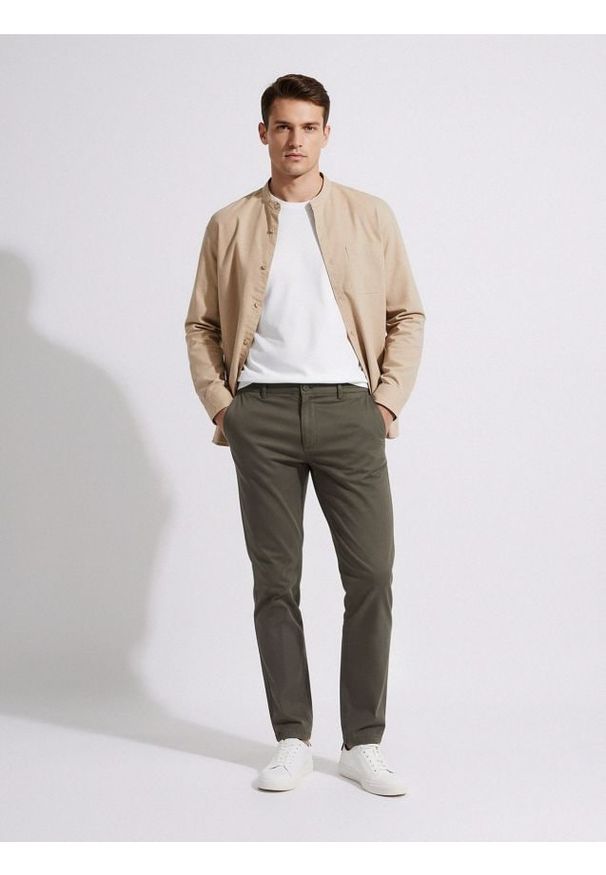 Sinsay - Spodnie chino slim - zielony. Kolor: zielony