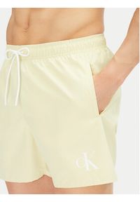 Calvin Klein Swimwear Szorty kąpielowe KM0KM01101 Beżowy Regular Fit. Kolor: beżowy. Materiał: syntetyk #4