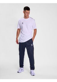 Spodnie dresowe polyesterowe Hummel Authentic. Kolor: niebieski. Materiał: dresówka. Sport: fitness, piłka nożna