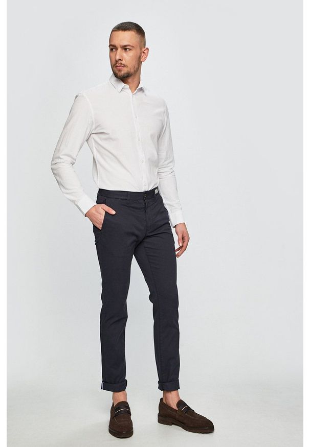 TOMMY HILFIGER - Tommy Hilfiger - Spodnie Denton Chino Org Str Twill 867895043. Okazja: na co dzień. Kolor: niebieski. Materiał: tkanina. Wzór: gładki. Styl: casual