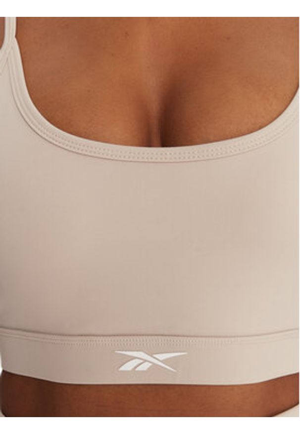 Reebok Biustonosz sportowy Reebok X Ewa Chodakowska RK25312CCW Beżowy. Kolor: beżowy. Materiał: syntetyk