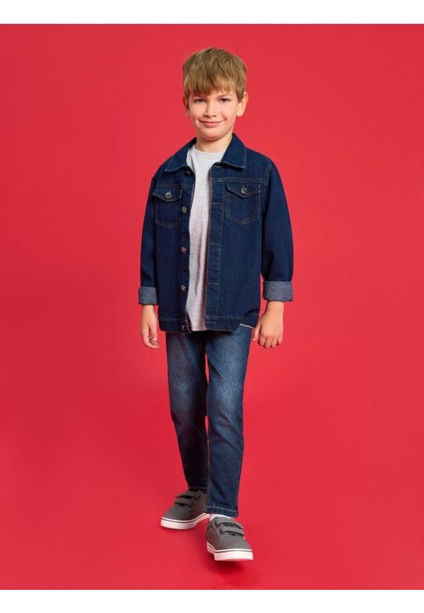 Sinsay - Spodnie jeansowe slim fit - granatowy. Kolor: niebieski