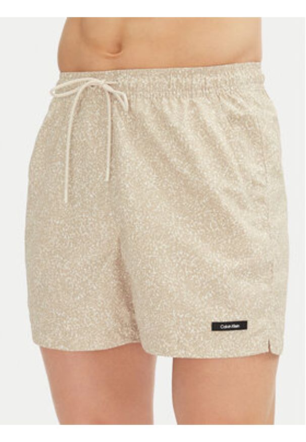 Calvin Klein Swimwear Szorty kąpielowe KM0KM01120 Beżowy Regular Fit. Kolor: beżowy. Materiał: syntetyk