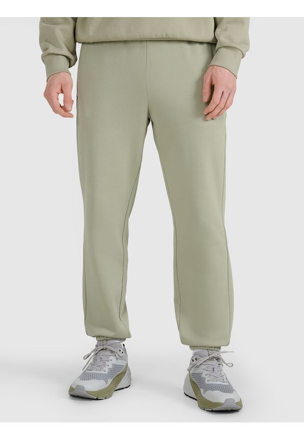 4f - 4F Spodnie dresowe joggery uniseks - oliwkowe S. Kolor: oliwkowy, brązowy, wielokolorowy. Materiał: dresówka. Wzór: ze splotem, gładki