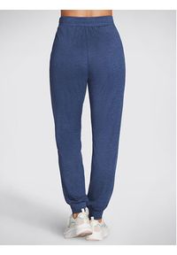 skechers - Skechers Spodnie dresowe Godri Swift Jogger WPT254 Niebieski Regular Fit. Kolor: niebieski. Materiał: syntetyk #4