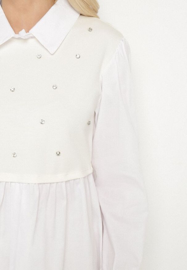 Born2be - Jasnobeżowa Rozkloszowana Bluzka Koszulowa z Wiskozą z Wszytą Kamizelką z Cyrkoniami Uliaviela. Okazja: na co dzień. Typ kołnierza: kołnierzyk klasyczny. Kolor: beżowy. Materiał: wiskoza. Długość rękawa: długi rękaw. Długość: długie. Wzór: aplikacja. Styl: casual, elegancki, klasyczny