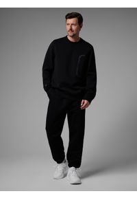 4f - 4F Spodnie dresowe joggery męskie 4F x Robert Lewandowski - czarne XL. Kolor: czarny. Materiał: dresówka. Wzór: nadruk #1
