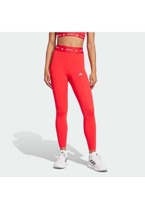 Adidas - Legginsy TECHFIT 7/8. Kolor: czerwony. Materiał: materiał. Technologia: Techfit (Adidas). Sport: fitness