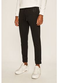 Armani Exchange - Spodnie. Kolor: czarny. Materiał: dzianina