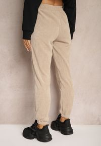 Renee - Ciemnobeżowe Dresowe Spodnie z Bawełną High Waist Wykończone w Pasie Gumką Ekadela. Stan: podwyższony. Kolor: beżowy. Materiał: bawełna, dresówka