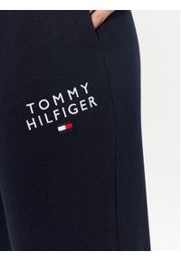 TOMMY HILFIGER - Tommy Hilfiger Spodnie dresowe UW0UW04522 Granatowy Regular Fit. Kolor: niebieski. Materiał: dresówka, syntetyk, bawełna