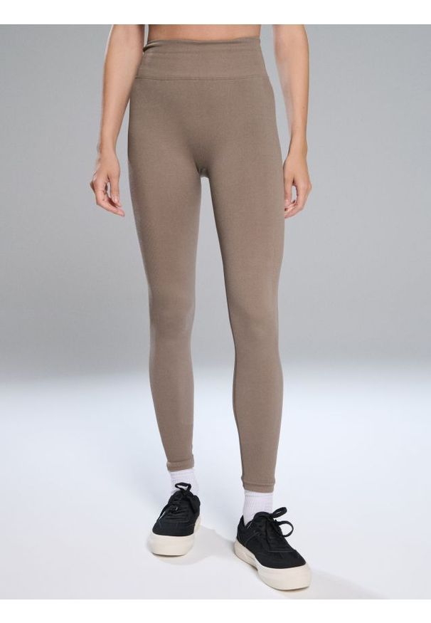 Sinsay - Legginsy sportowe - kremowy. Kolor: kremowy. Styl: sportowy