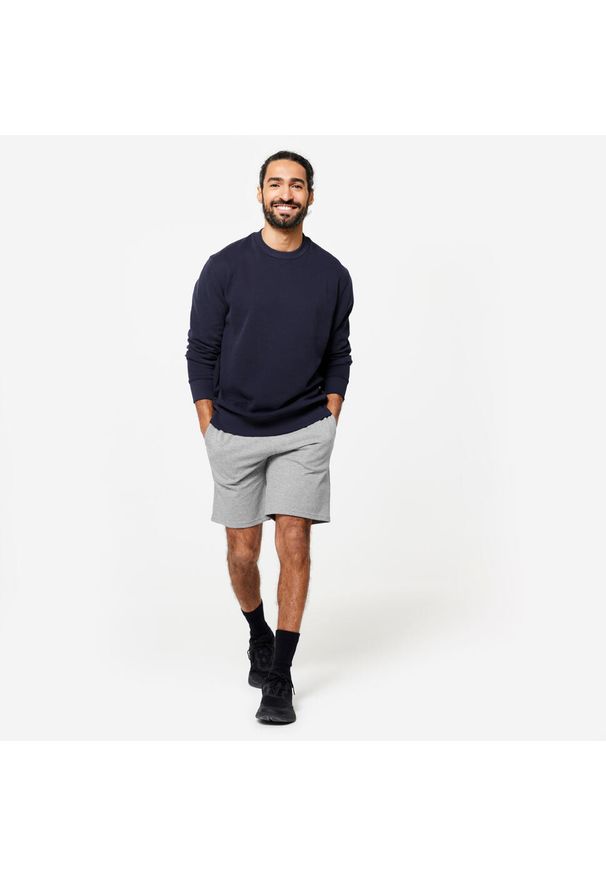 DOMYOS - Bluza męska Domyos Gym & Pilates. Kolor: niebieski. Materiał: poliester, elastan, tkanina, prążkowany, bawełna, materiał. Wzór: ze splotem. Sezon: lato. Sport: joga i pilates