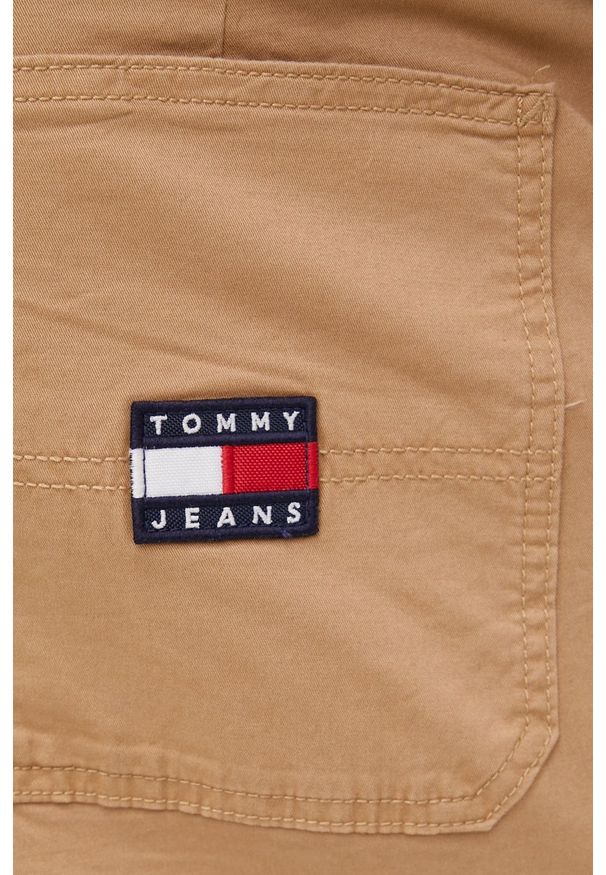 Tommy Jeans spodnie męskie kolor beżowy w fasonie chinos. Kolor: beżowy. Materiał: bawełna, tkanina. Wzór: gładki