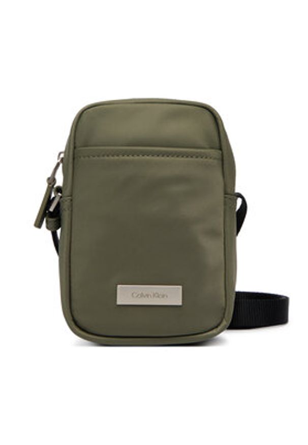 Calvin Klein Saszetka Sleek Slim Reporter LV04D3233G Zielony. Kolor: zielony. Materiał: materiał