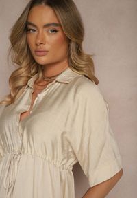 Renee - Jasnobeżowa Wiskozowa Sukienka o Koszulowym Kroju z Wiązaniem w Talii Nanovias. Okazja: na co dzień, do pracy. Typ kołnierza: kołnierzyk klasyczny. Kolor: beżowy. Materiał: wiskoza. Długość rękawa: krótki rękaw. Typ sukienki: koszulowe. Styl: klasyczny, elegancki, casual