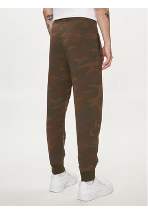 GAP - Gap Spodnie dresowe 804257-01 Brązowy Regular Fit. Kolor: brązowy. Materiał: bawełna, syntetyk