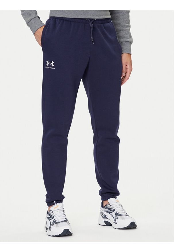 Under Armour Spodnie dresowe UA Essential Fleece Jogger 1373882 Granatowy Regular Fit. Kolor: niebieski. Materiał: bawełna