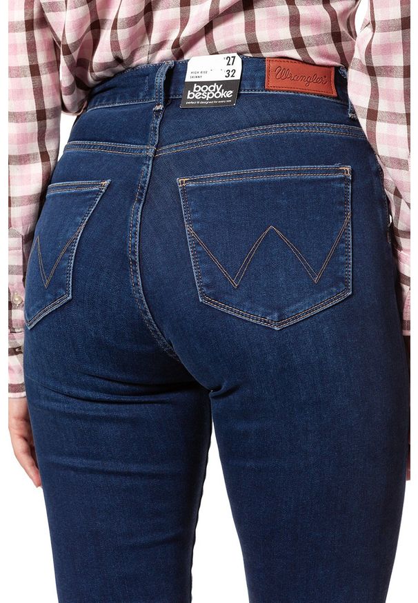 Wrangler - WRANGLER HIGH SKINNY COSY FEEL W27HRL21L 112128114. Stan: podwyższony. Wzór: aplikacja, jednolity
