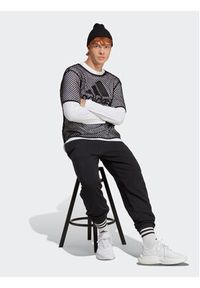 Adidas - adidas Spodnie dresowe ALL SZN IC9770 Czarny Regular Fit. Kolor: czarny. Materiał: bawełna