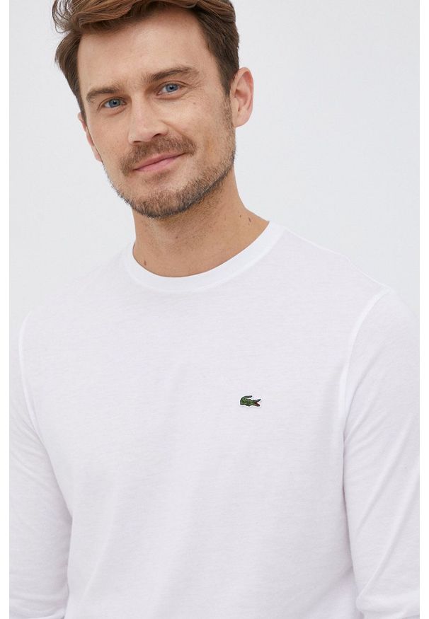Lacoste - Longsleeve. Okazja: na co dzień. Kolor: biały. Materiał: materiał. Długość rękawa: długi rękaw. Styl: casual