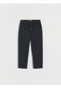 Reserved - Spodnie z ociepleniem - czarny. Kolor: czarny. Materiał: bawełna, włókno, tkanina
