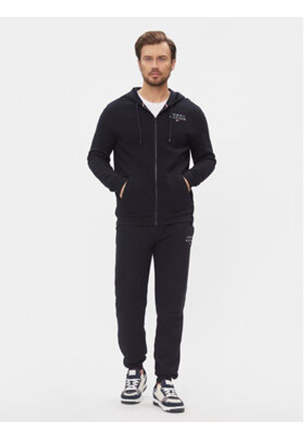 TOMMY HILFIGER - Tommy Hilfiger Spodnie dresowe UM0UM02983 Granatowy Regular Fit. Kolor: niebieski. Materiał: bawełna, syntetyk