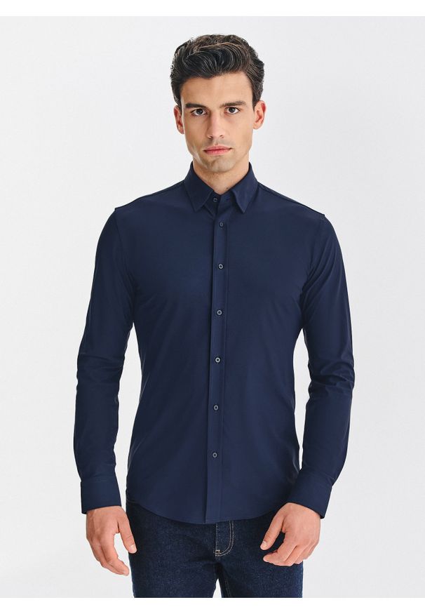 Pako Lorente - PAKO LORENTE – Granatowa koszula męska. Typ kołnierza: kołnierzyk klasyczny. Kolor: niebieski. Materiał: elastan, nylon. Długość rękawa: długi rękaw. Długość: długie. Styl: klasyczny