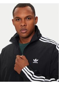 Adidas - adidas Bluza adicolor Firebird IT2491 Czarny Loose Fit. Kolor: czarny. Materiał: syntetyk #5