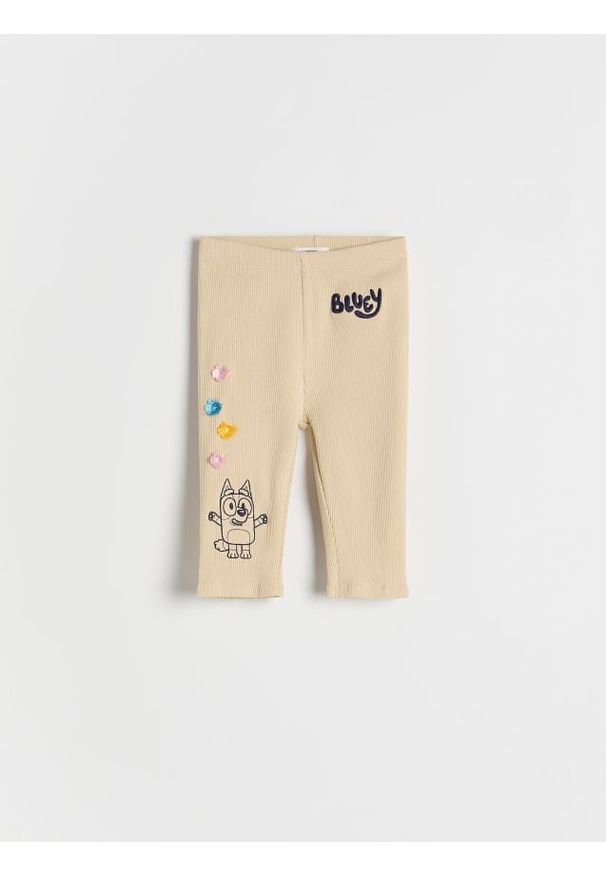 Reserved - Legginsy 3/4 Bluey - beżowy. Kolor: beżowy. Materiał: bawełna. Długość: krótkie