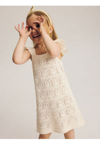 Reserved - Ażurowa sukienka - złamana biel. Materiał: bawełna, dzianina, wiskoza. Wzór: ażurowy