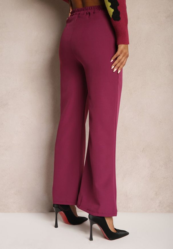 Renee - Ciemnofioletowe Szerokie Spodnie Materiałowe High Waist Dinnes. Stan: podwyższony. Kolor: fioletowy. Materiał: materiał. Wzór: gładki