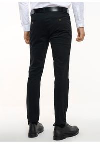 Ochnik - Czarne spodnie męskie. Kolor: czarny. Materiał: materiał
