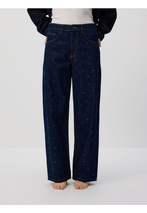 Reserved - Jeansy baggy z kryształkami - granatowy. Kolor: niebieski