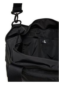 Calvin Klein Jeans Torba Over Webbing K50K512568 Czarny. Kolor: czarny. Materiał: materiał #3