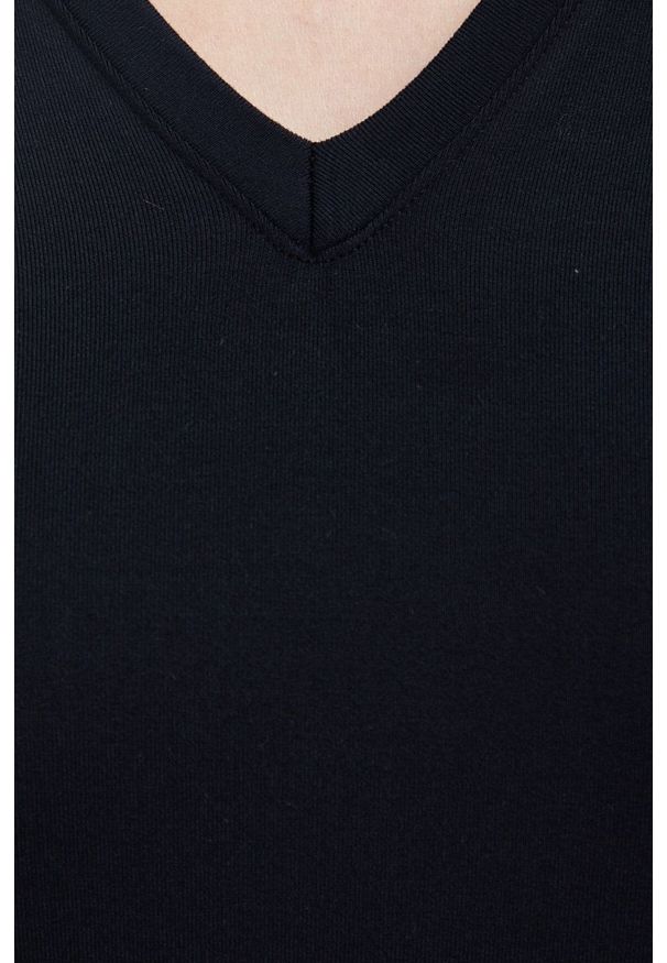 Spanx - Longsleeve modelujący SLEEVE V-NECK BODYSUIT. Kolor: czarny. Materiał: materiał