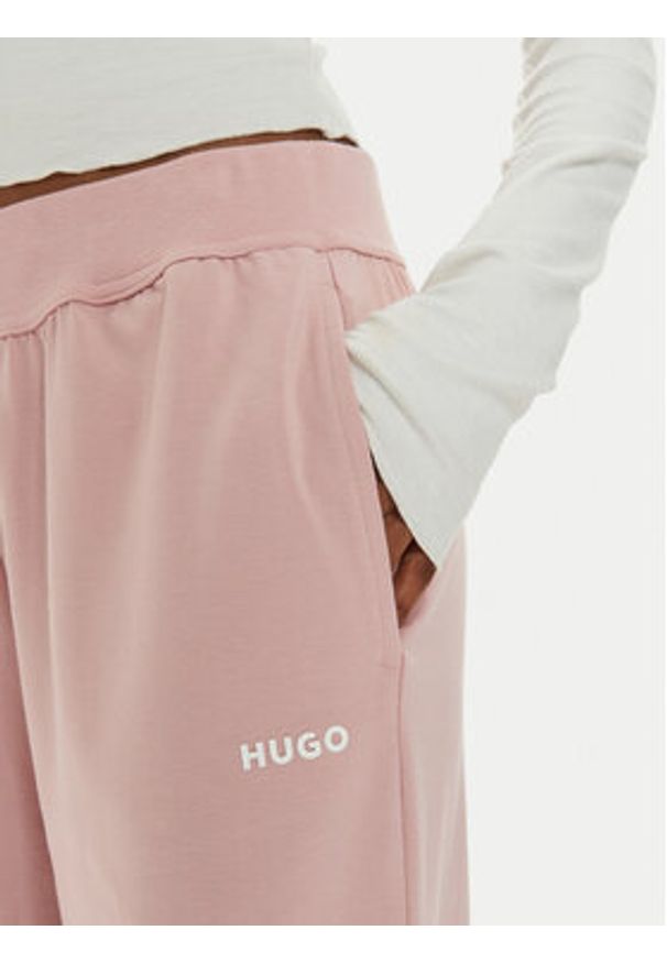 Hugo Spodnie dresowe 50490578 Różowy Regular Fit. Kolor: różowy. Materiał: dresówka, bawełna