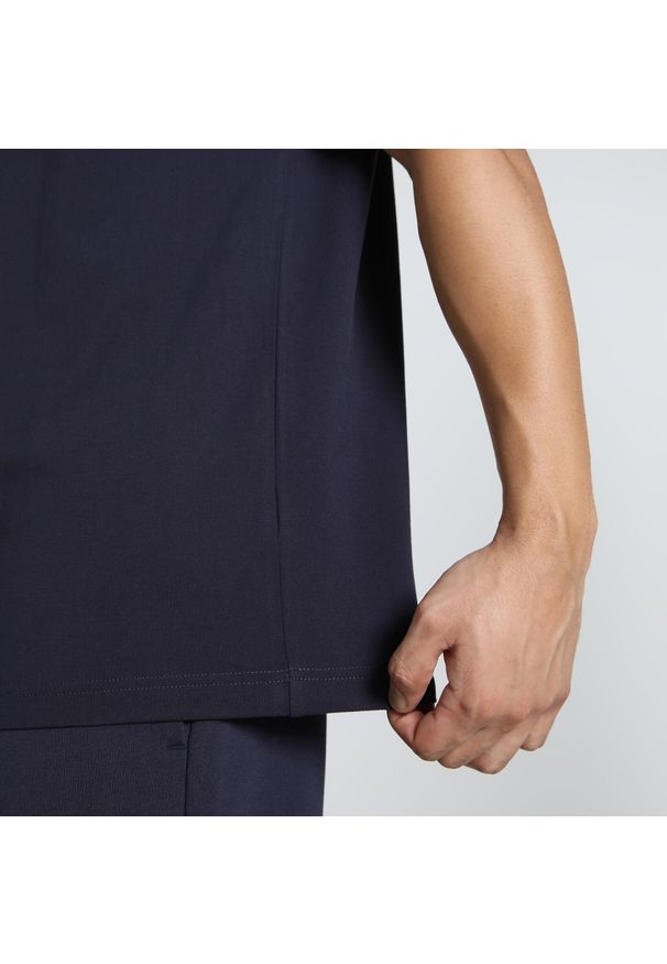 Puma - Męska koszulka polo Essentials z logo No. 1 z piki PUMA. Okazja: na co dzień. Typ kołnierza: polo. Kolor: niebieski. Materiał: prążkowany. Wzór: haft. Styl: casual