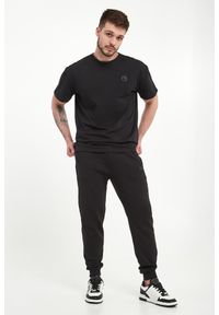 Plein Sport - Spodnie dresowe męskie PLEIN SPORT. Materiał: dresówka #1